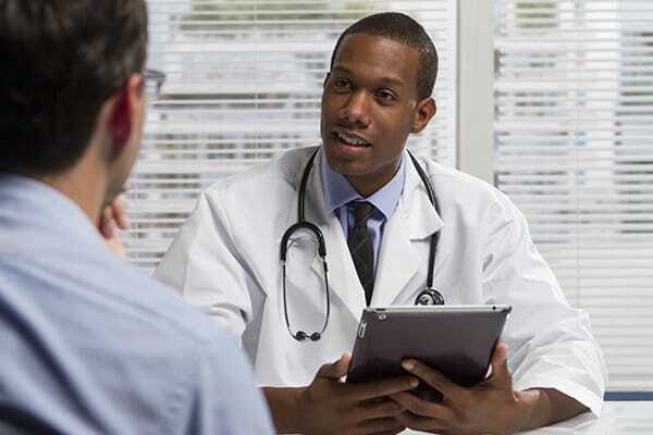 doctor in orthobiologic consultation for PRP injections