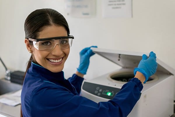 woman preparing platelet rich plasma for injection